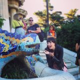 Having a laugh with Gaudi's lizard at Park Guell