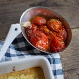 Baked feta with cherry tomatoes and bread salad