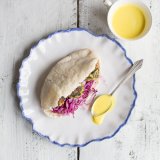 Spinach polpette and slaw pitas with cashew mayo