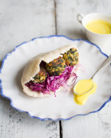 Spinach polpette and slaw pitas with cashew mayo